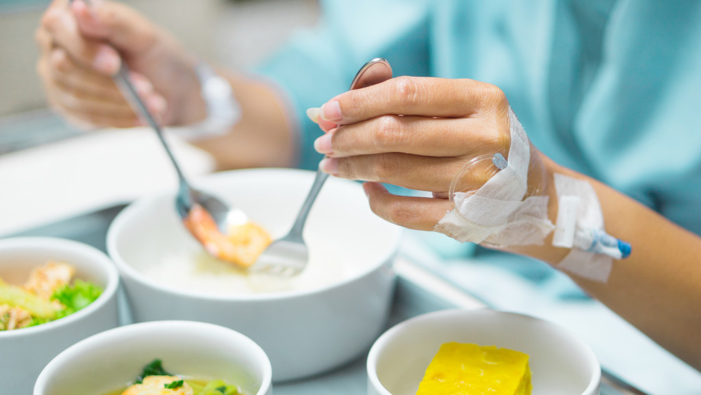 Patient eating hospital food